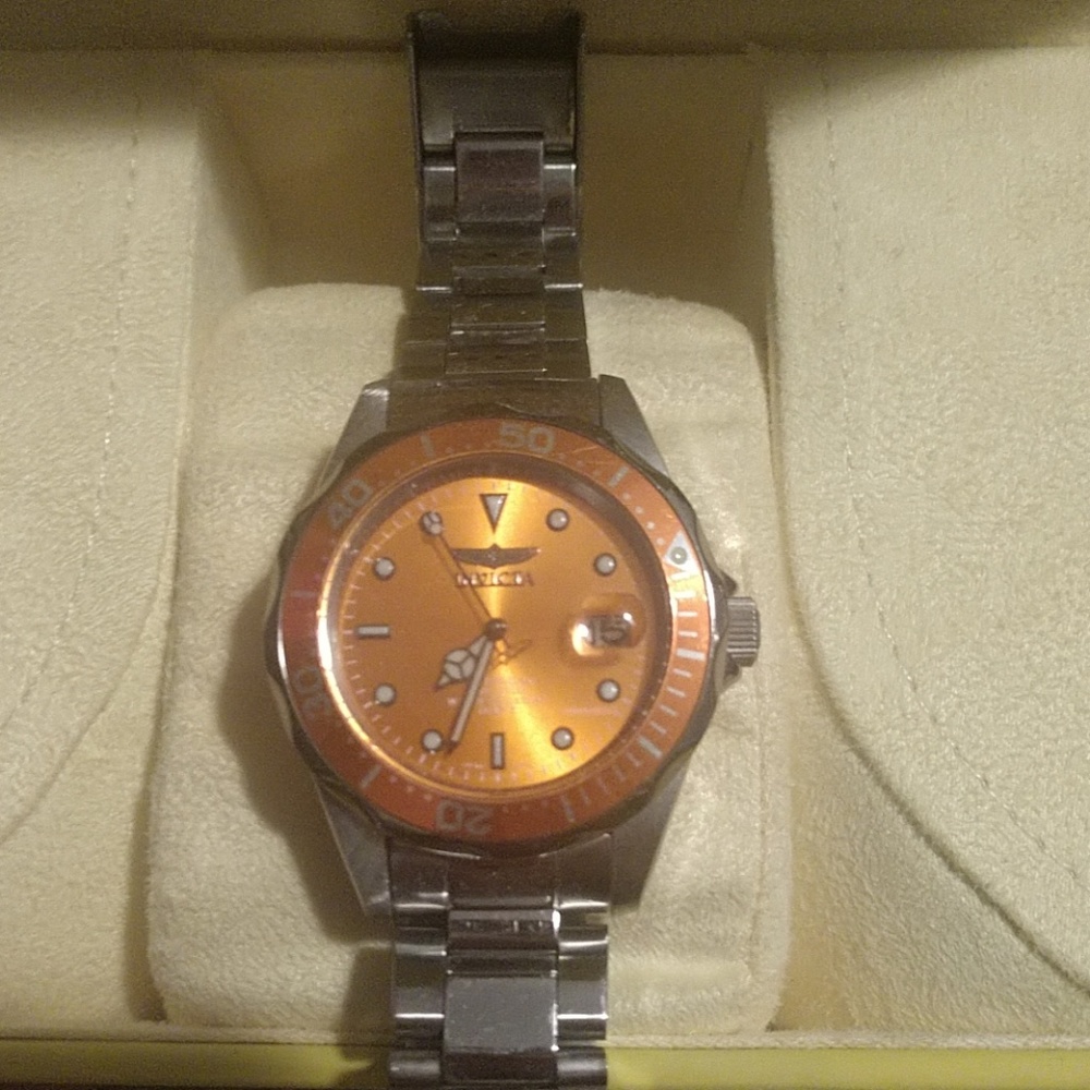 Orange and silver Invicta dove watch